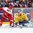 MOSCOW, RUSSIA - MAY 8: Denmark's Mads Christensen #12 looks for a scoring chance against Sweden's Viktor Fasth #30 during preliminary round action at the 2016 IIHF Ice Hockey Championship. (Photo by Andre Ringuette/HHOF-IIHF Images)

